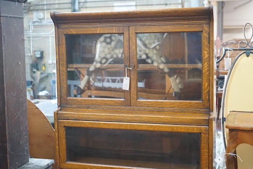 An early 20th century Globe Wernicke style oak four section glazed bookcase, width 87cm, depth 32cm, height 179cm